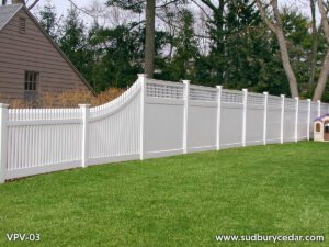 Custom white vinyl privacy fence with decorative lattice-top panels and curved transition design installed in Weston, Massachusetts, combining backyard privacy with elegant architectural detail and low-maintenance durability.