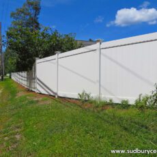Vinyl board fence by Sudbury Cedar Fence Co