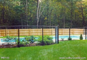 Chain link and Cedar fence installation surrounding pool by Sudbury Cedar Fence Co in Hudson, MA