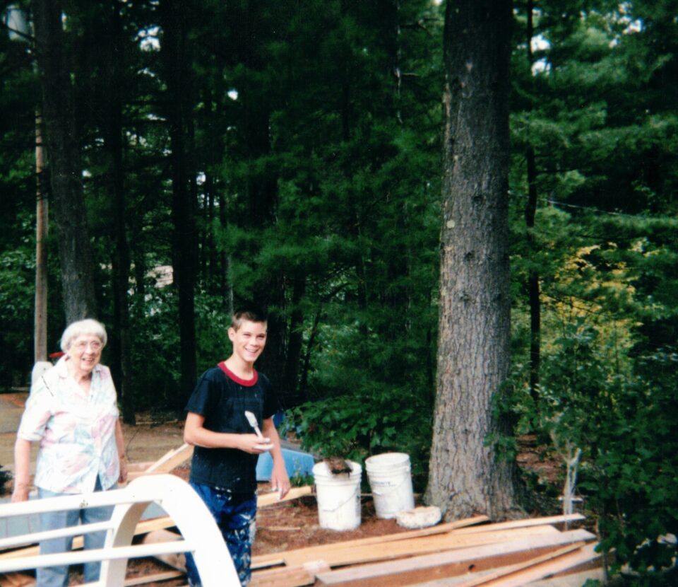 Rich, co-owner of Sudbury Cedar, as a young kid painting fences with his grandmother.