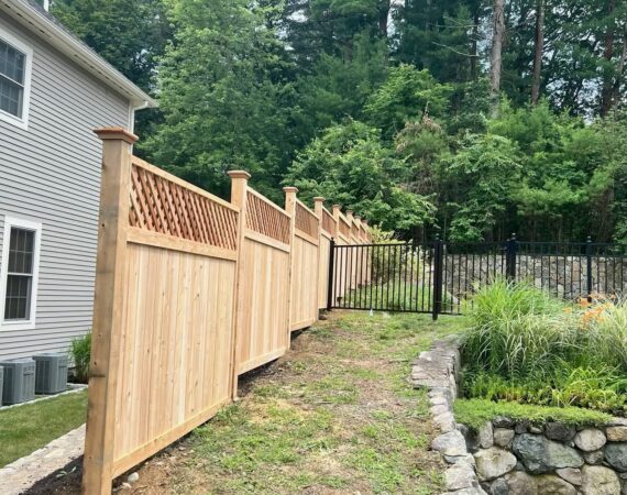 Board lattice fence stepped with slope, Wayland MA