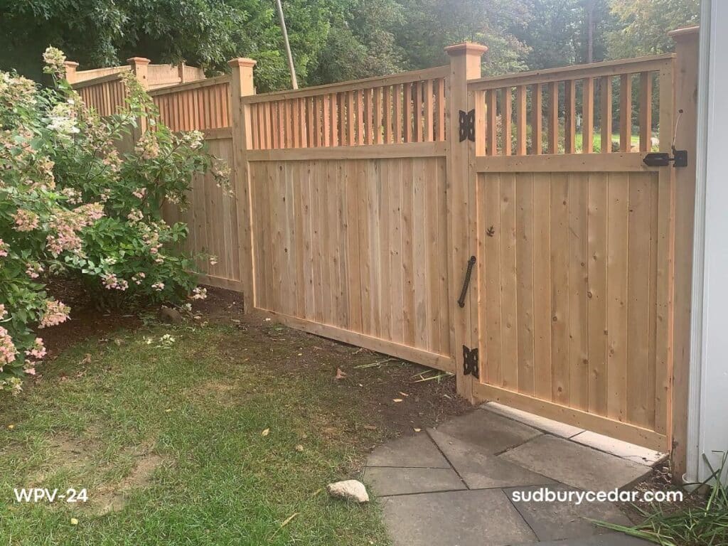 Cedar privacy fence with custom wood gate and black hardware in Acton, MA