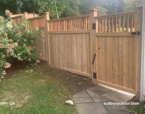 Cedar privacy fence with custom wood gate and black hardware in Acton, MA