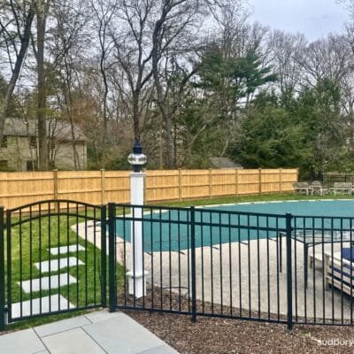 Aluminum fence around pool in MetroWest Massachusetts