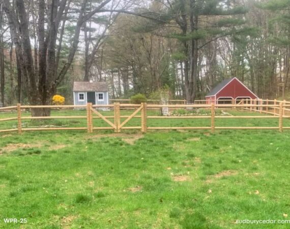 Cedar post and rail fence with wire.