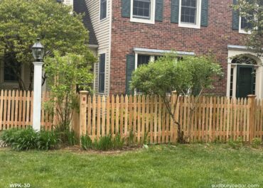 Cedar flat pointed spaced board fence in Sudbury, MA.