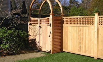 Natural cedar board gate and arbor, paired with lattice top cedar fence , Weston, MA