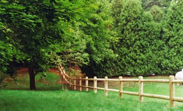 Round Cedar Post and Rail Doweled Fence by Sudbury Cedar Fence Co in Hudson, MA